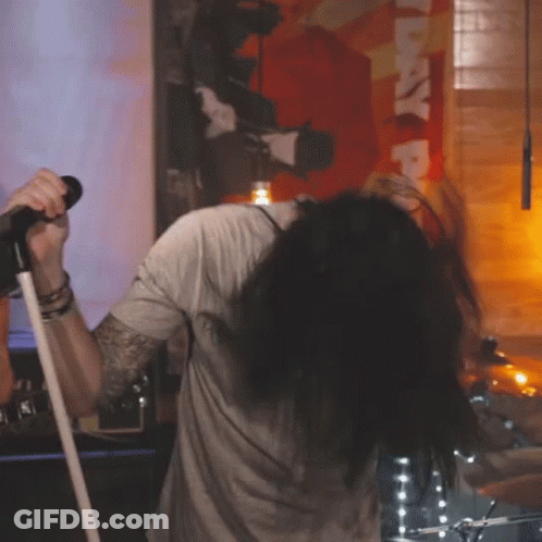 Man Singing Into Microphone GIF