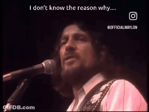 Man Singing Into Microphone And Playing Guitar GIF