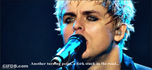 Man Singing Into Microphone Another Turning Point A Fork Stuck In The Road GIF