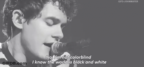 Man Singing Into Microphone Black And White Photo GIF