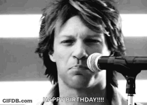 Man Singing Into Microphone Black And White GIF