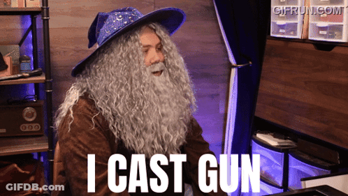 Man Singing Into Microphone Blue Jacket GIF
