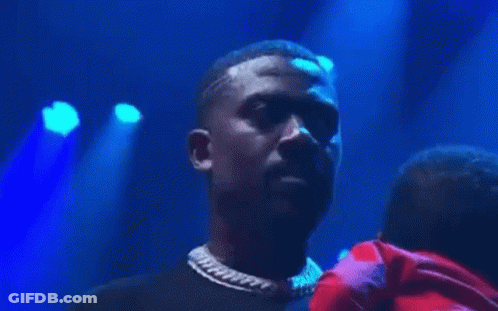 Man Singing Into Microphone Blue Light GIF