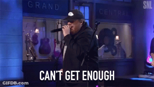 Man Singing Into Microphone Can't Get Enough GIF