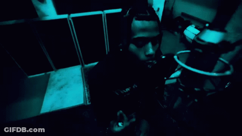Man Singing Into Microphone GIF