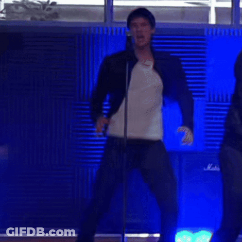 Man Singing Into Microphone Dancing Beside Marshall Amp GIF