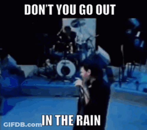 Man Singing Into Microphone Don't You Go Out In The Rain GIF