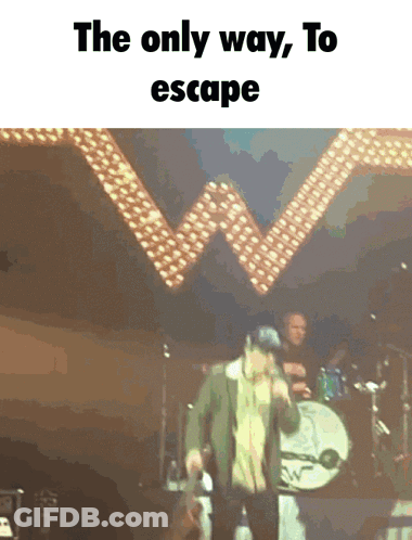 Man Singing Into Microphone Escape GIF