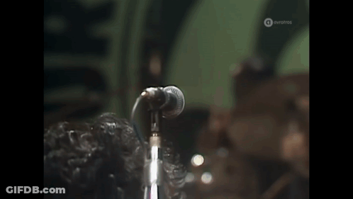 Man Singing Into Microphone Euro GIF