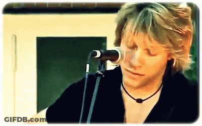 Man Singing Into Microphone Eyes Closed GIF
