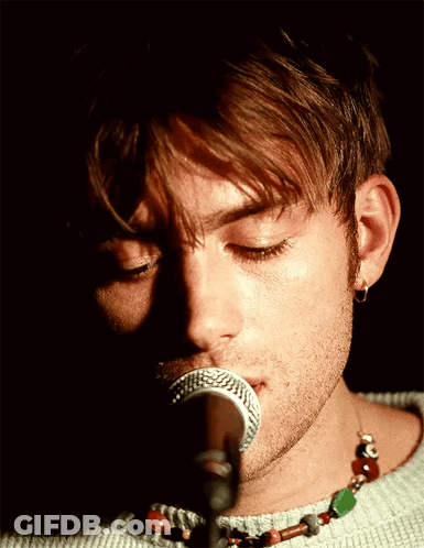 Man Singing Into Microphone Eyes Closed GIF
