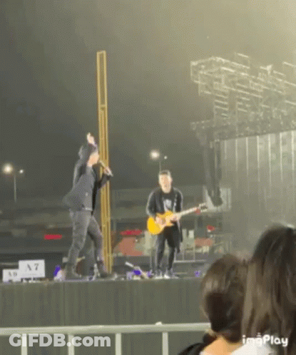 Man Singing Into Microphone GIF