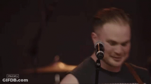 Man Singing Into Microphone GIF