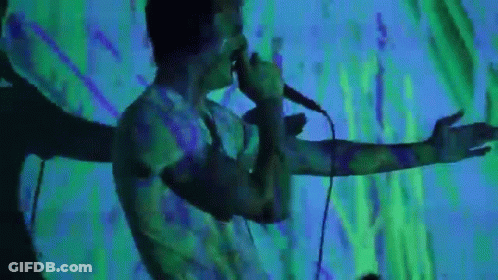 Man Singing Into Microphone GIF