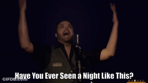Man Singing Into Microphone Have You Ever Seen A Night Like This GIF
