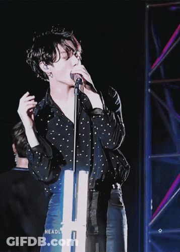 Man Singing Into Microphone Headlight GIF