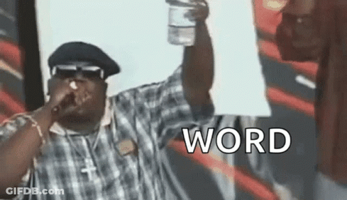 Man Singing Into Microphone Holding Water Bottle And Word Sign GIF