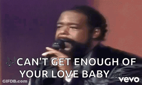 Man Singing Into Microphone I Can't Get Enough Of Your Love Baby GIF