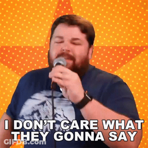 Man Singing Into Microphone I Don't Care What They Gonna Say GIF