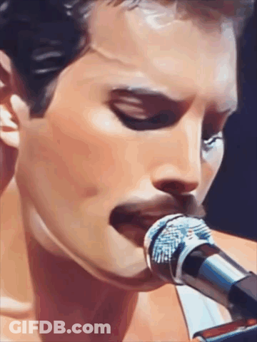 Man Singing Into Microphone GIF