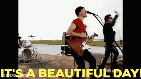 Man Singing Into Microphone It's A Beautiful Day GIF