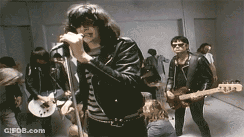 Man Singing Into Microphone GIF