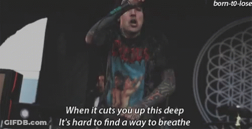 Man Singing Into Microphone GIF