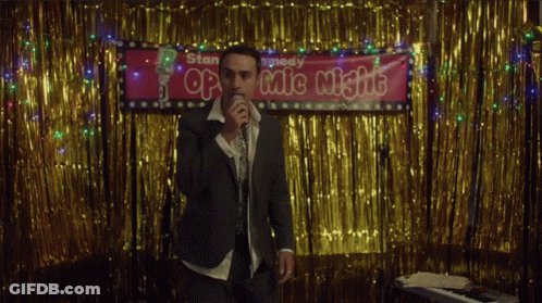Man Singing Into Microphone GIF