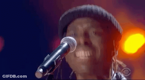 Man Singing Into Microphone GIF