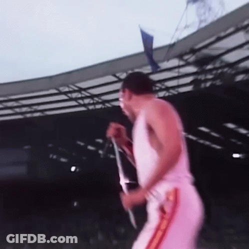 Man Singing Into Microphone GIF