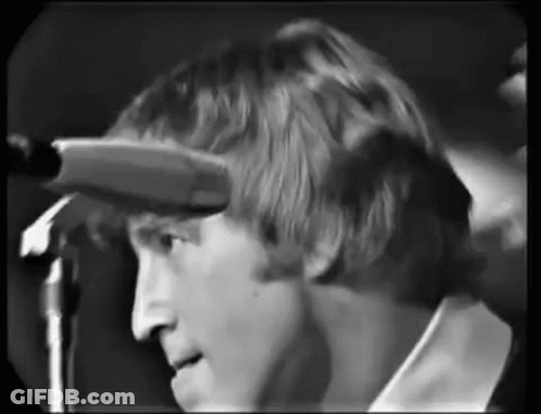Man Singing Into Microphone GIF