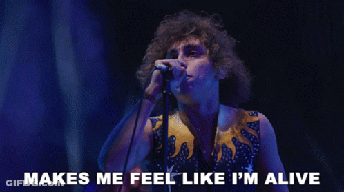 Man Singing Into Microphone Makes Me Feel Alive GIF