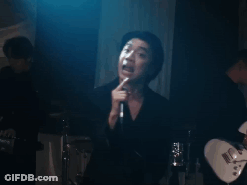 Man Singing Into Microphone Mouth Open GIF