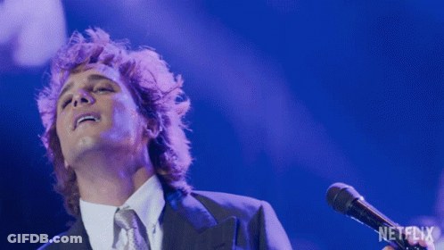 Man Singing Into Microphone Netflix Logo GIF
