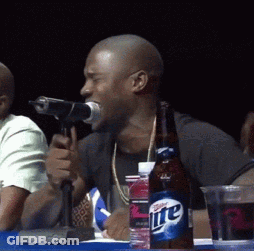Man Singing Into Microphone Next To Miller Lite GIF