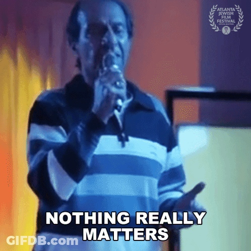 Man Singing Into Microphone Nothing Really Matters GIF