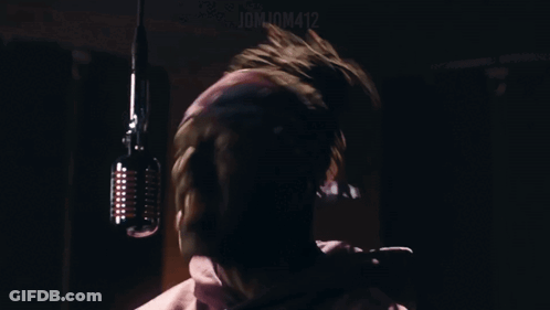 Man Singing Into Microphone Number 12 GIF