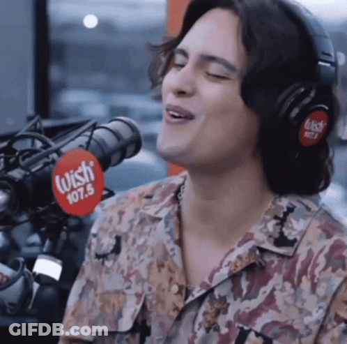 Man Singing Into Microphone GIF