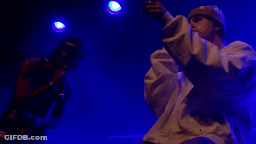 Man Singing Into Microphone GIF