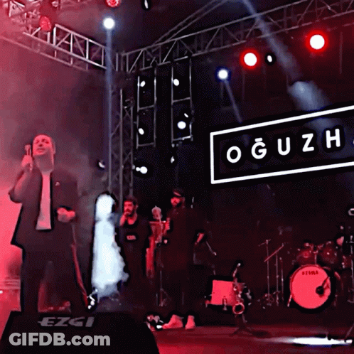 Man Singing Into Microphone Oğuzh Sign GIF