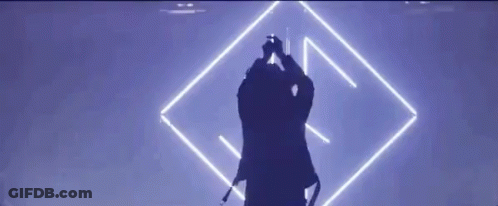 Man Singing Into Microphone On Stage GIF