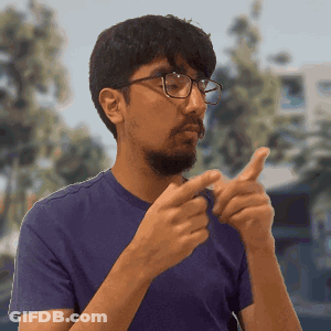Man Singing Into Microphone On Stage GIF