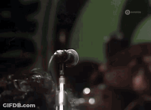Man Singing Into Microphone Ovofros GIF