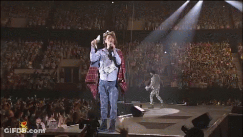 Man Singing Into Microphone GIF