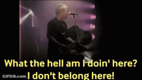 Man Singing Into Microphone Playing Guitar GIF