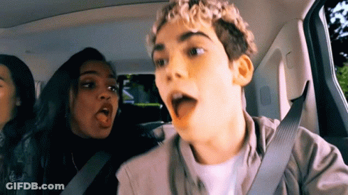 Man Singing Into Microphone Playing Keyboard GIF