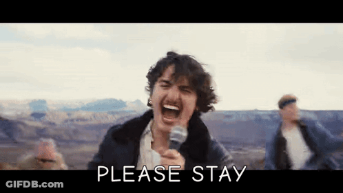 Man Singing Into Microphone Please Stay GIF