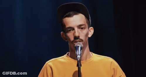 Man Singing Into Microphone GIF