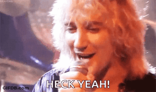 Man Singing Into Microphone Saying Heck Yeah GIF