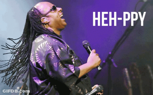 Man Singing Into Microphone Saying Heh-Ppy GIF